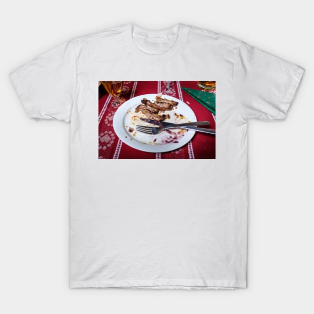 on the plate there are only leftovers from the grilled ribs as well as the knife and fork T-Shirt by connyM-Sweden
